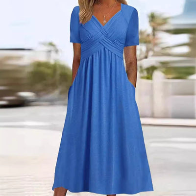 Delilah™ | Midi-jurk met taille-naad en zakken