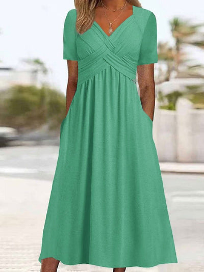 Delilah™ | Midi-jurk met taille-naad en zakken