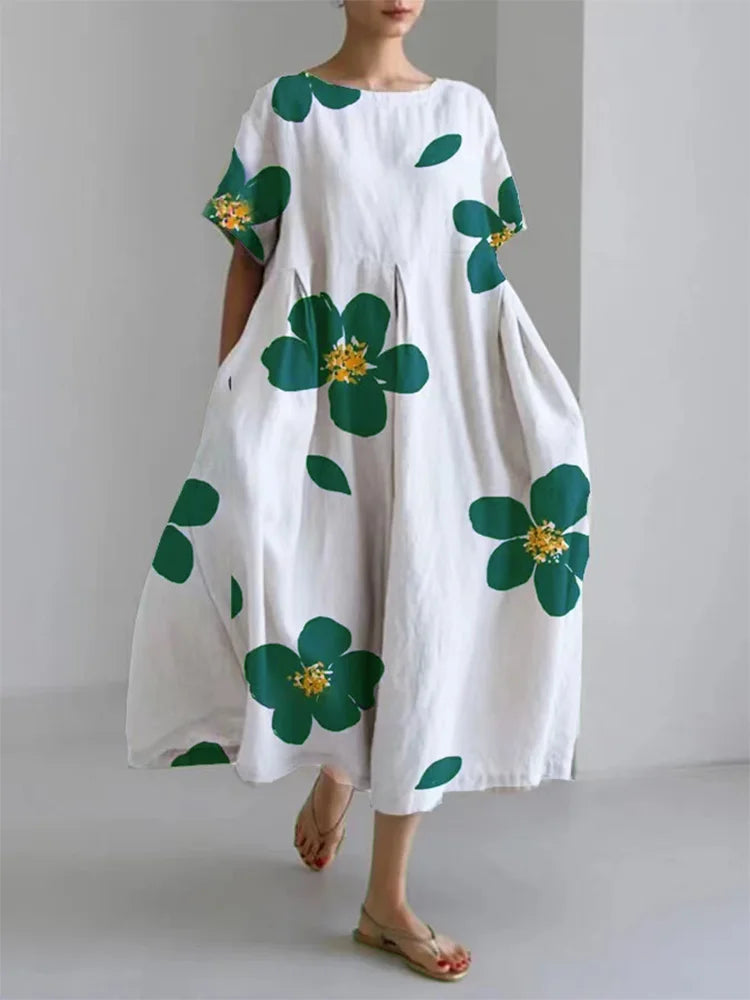 MIRA - LUCHTIG JURK MET BLOEMENACCENTEN