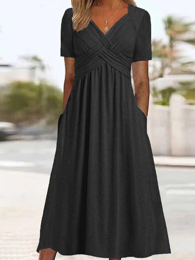 Delilah™ | Midi-jurk met taille-naad en zakken