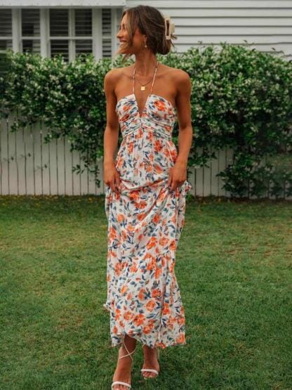 Louise - Maxi-zomerjurk met halter en bloemenpatroon