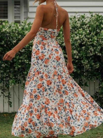 Louise - Maxi-zomerjurk met halter en bloemenpatroon