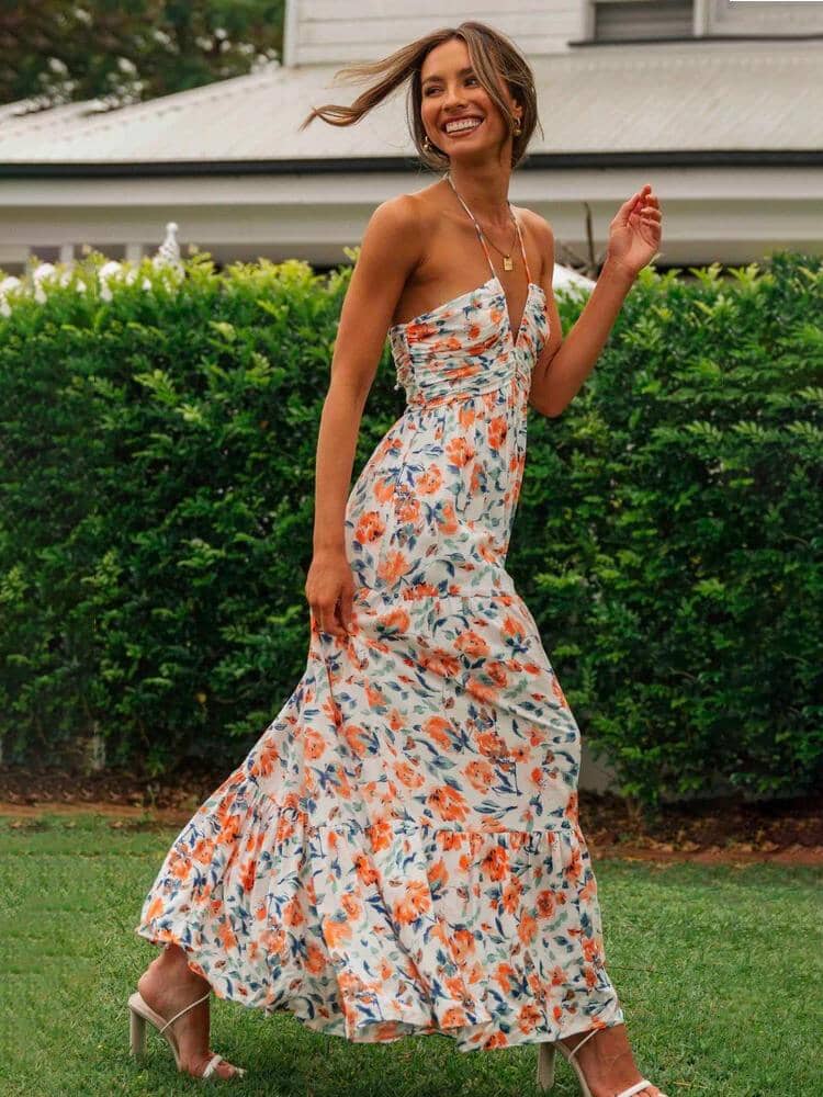 Louise - Maxi-zomerjurk met halter en bloemenpatroon