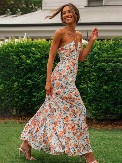 Louise - Maxi-zomerjurk met halter en bloemenpatroon