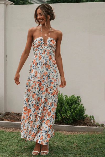 Louise - Maxi-zomerjurk met halter en bloemenpatroon
